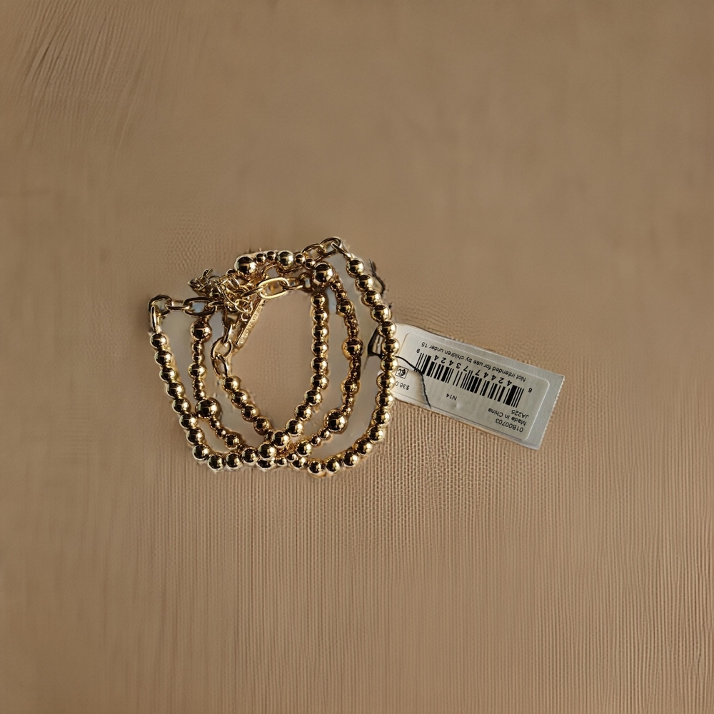 Anne Klein 3 goldtone braclets